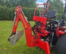 Backhoe digger for compact tractor.
