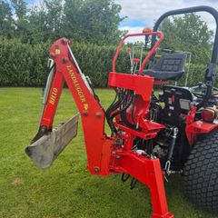 Backhoe digger for compact tractor.