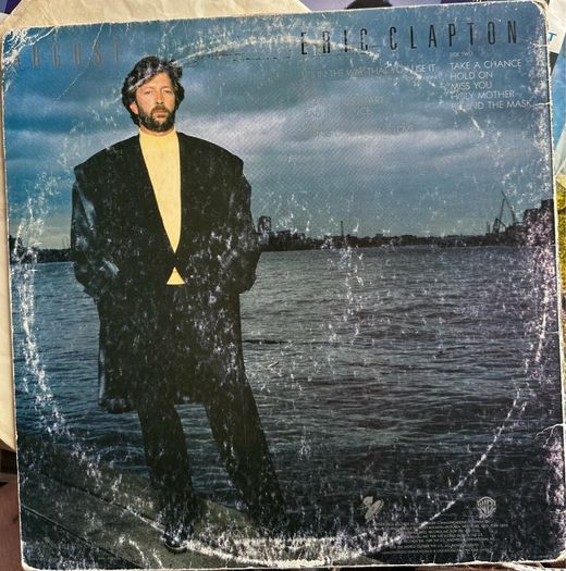 Eric Clapton original 1986 release of August. Vinyl is nm sleeve showing signs of wear