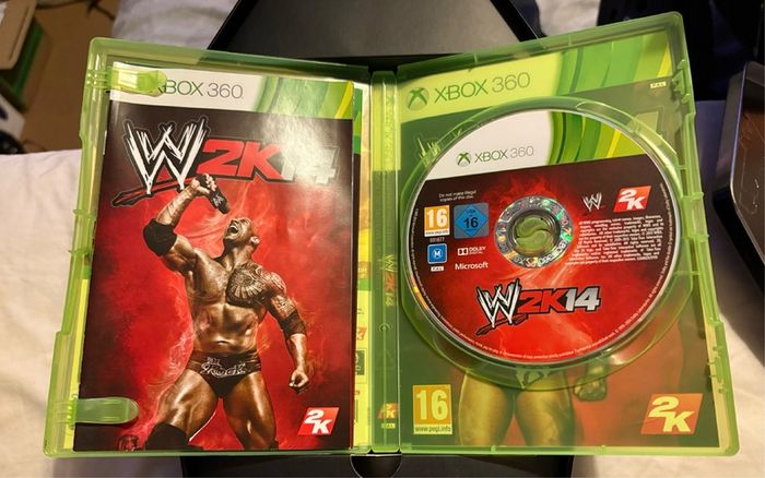 wwe 2k14 Phenom Edition complete with Undertaker autograph