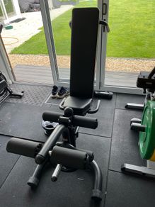 body solid bench with leg attachment