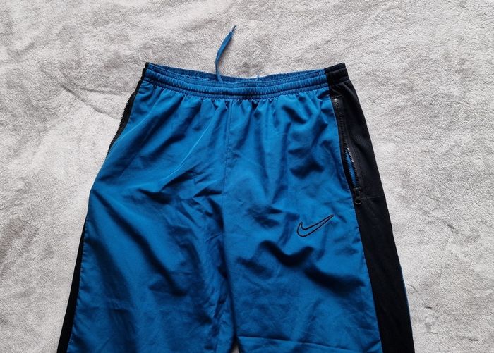 Nike tracksuit bottoms 12-13y