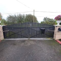 Metal framed 2 leaf gate with timbers