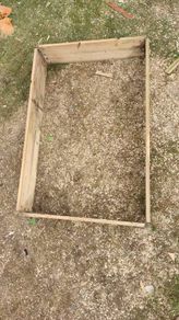 Wooden raised flower bed.