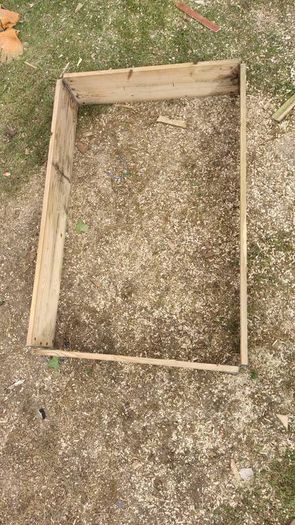 Wooden raised flower bed.