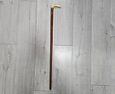 antique wooden cane or walking stick