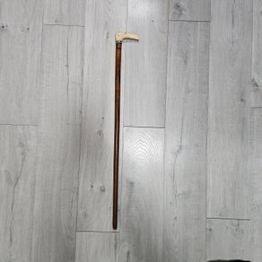 antique wooden cane or walking stick