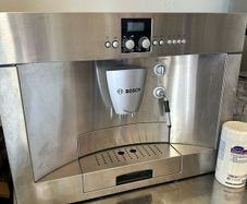 Bosch  coffee machine with sliding drawer. Can be fitted in to house wall or camper van office.