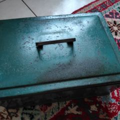 Vintage green metal cash box with key