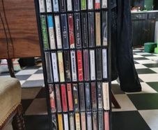 60 cassette tapes and cassette rack