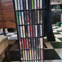 60 cassette tapes and cassette rack