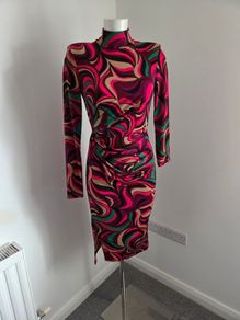 New. Stunning Multicoloured long-sleeved bodycon dress with flattering ruching at side.