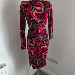 New. Stunning Multicoloured long-sleeved bodycon dress with flattering ruching at side.
