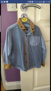 next boy  shirt never worn size 3-4 years