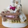 A Statue of Rococo lovers on a bench Image 3