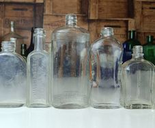 492 - Set of 7 Vintage Clear Glass Screw Cork Top Collectible Decorative Bottles