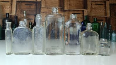 492 - Set of 7 Vintage Clear Glass Screw Cork Top Collectible Decorative Bottles