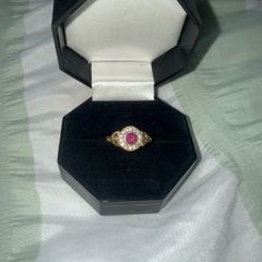 10ct gold, ruby and diamond cluster ring