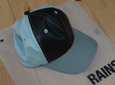 "RAINS" baseball type cap