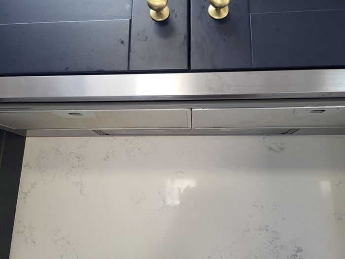 Kitchen units, island and quartz worktops.