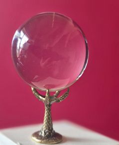 Crystal/ball and metal claw stand.