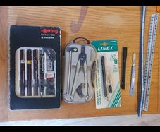 protractor, metric ruler , rotring set water and fade pens