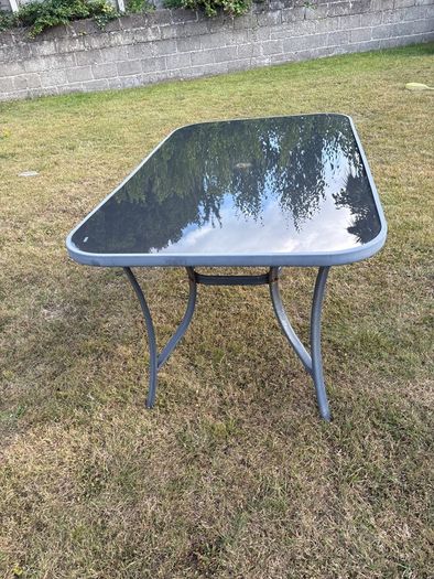 Outdoor glass top dining table