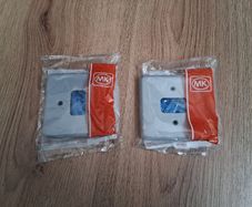Two MK Grid 1-Module Switch Grid Faceplate Grey
