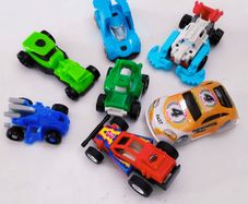 Lot of 7 Mini cars from Kinder Surprise eggs including Takara Blue Dune Buggy Penny Pull Back Racer
