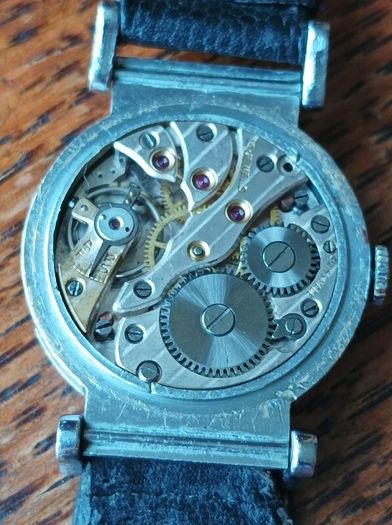 very old manual Foreign watch. Leather strap. Working. Beautiful 15 Jewels manual wind movement Swiss made .