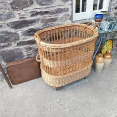 large wicker Laundry / Bakery Basket on wheels 34" long