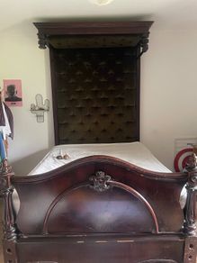 Antique wooden half-tester bed