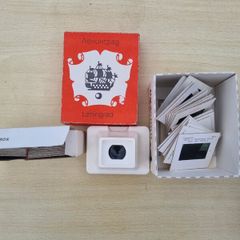 Soviet diaskop (slide viewer) with slides of views of Leningrad