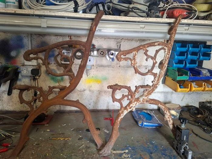 old garden  bench ends with wexford written on them