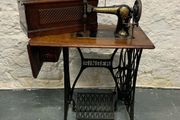 Vintage Singer Cast Iron Sewing Table with Jones 6400 Machine.