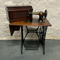 Vintage Singer Cast Iron Sewing Table with Jones 6400 Machine.