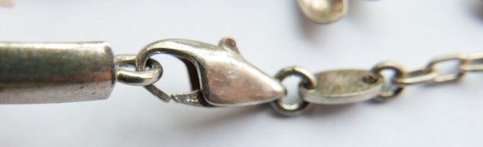 Vintage 925 Sterling Silver charm bracelet with flower charms