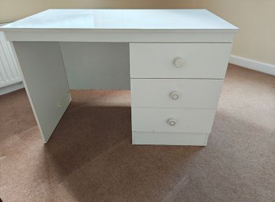 White desk with three good sized drawers.