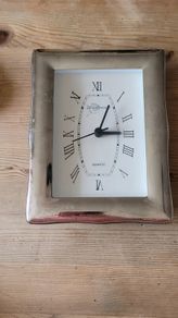 Silver framed clock