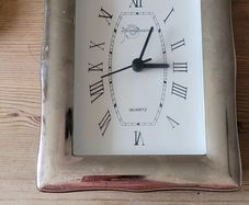 Silver framed clock