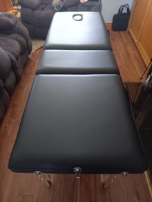 Adjustable massage table and swivel stool
