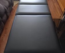 Adjustable massage table and swivel stool