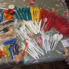 Mixture of plastic cutlery,2 metal spoons,measuring spoons/cups and mini straws