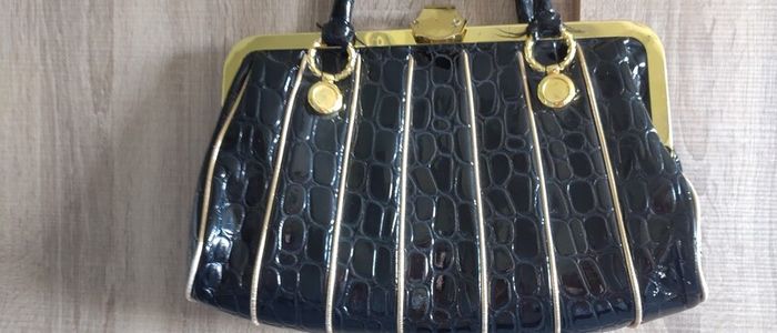 Black lacquered gold bag