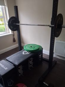 squat rack with weights and adjustable bench