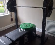 squat rack with weights and adjustable bench