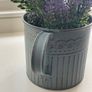 Faux plant in a watering can Image 3