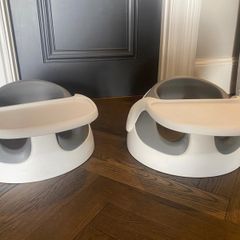 Bumboo seat. 2 available. 30 euro each .Grey with 1 tray toy piece