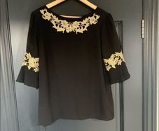 Oasis black /gold top