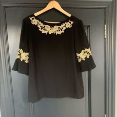 Oasis black /gold top